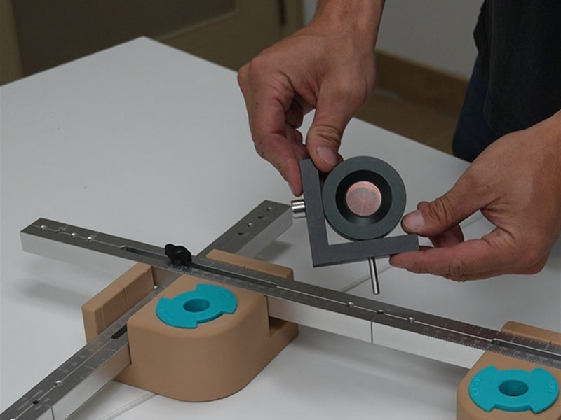 Hands-free AnkrPrism being set on an AnkrRise aluminum rail